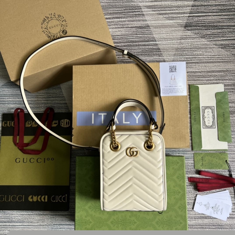 G*u*i top handle bags